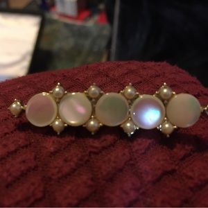 Mother of pearl brooch with seed pearls